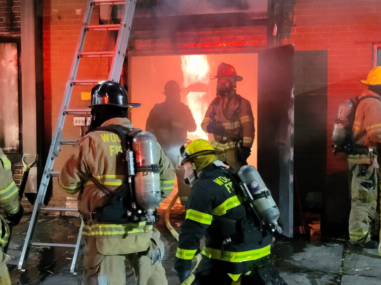 Firefighters fighting a house fire