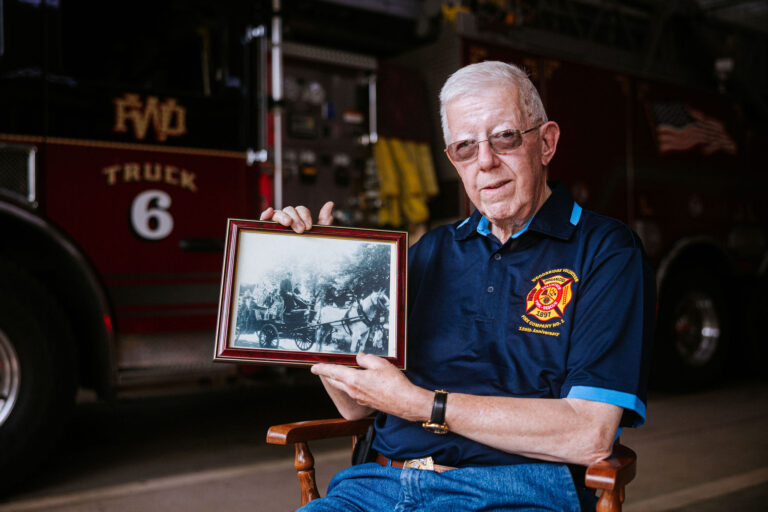 Woodbridge Fire Company #1 - Todd holds a historic photo